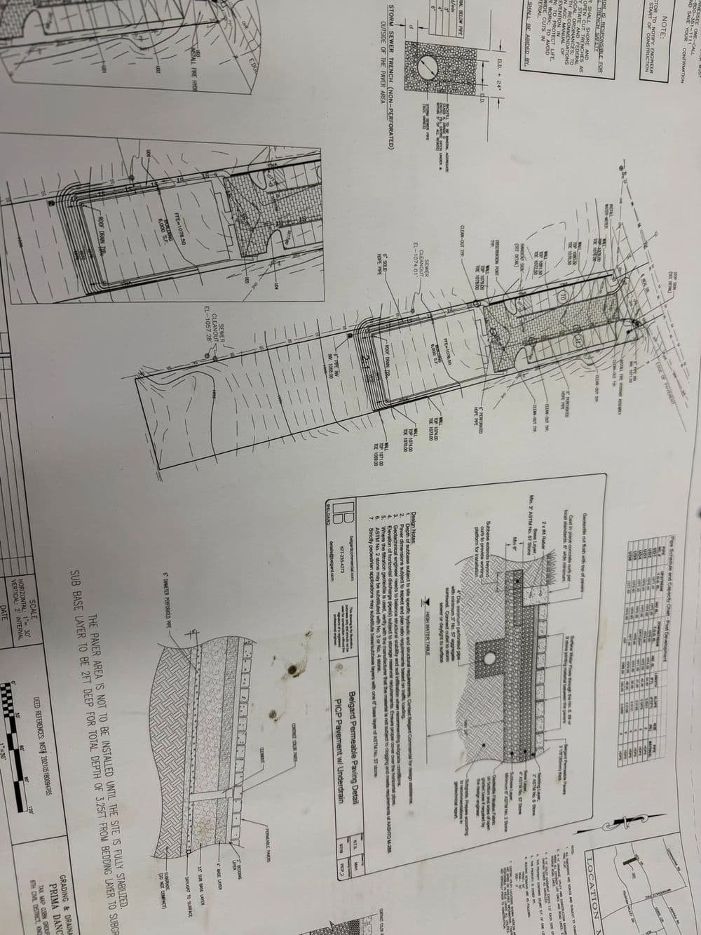 Engineering blueprint with detailed diagrams and measurements for construction project.